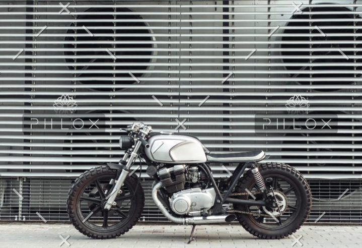 demo-attachment-17-motorcycle-standing-in-dark-building-in-rays-of-P6PVJNM-e1559381296852