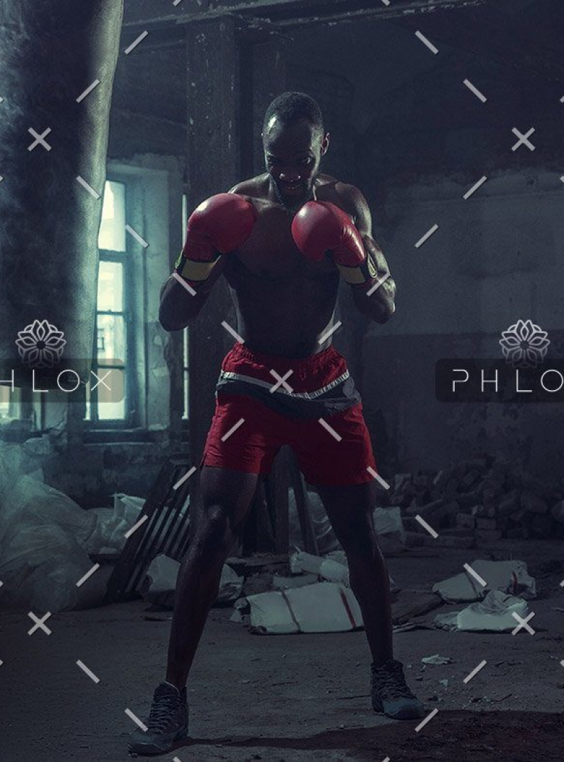 demo-attachment-400-hand-of-boxer-over-black-background-strength-L7JXP4Q